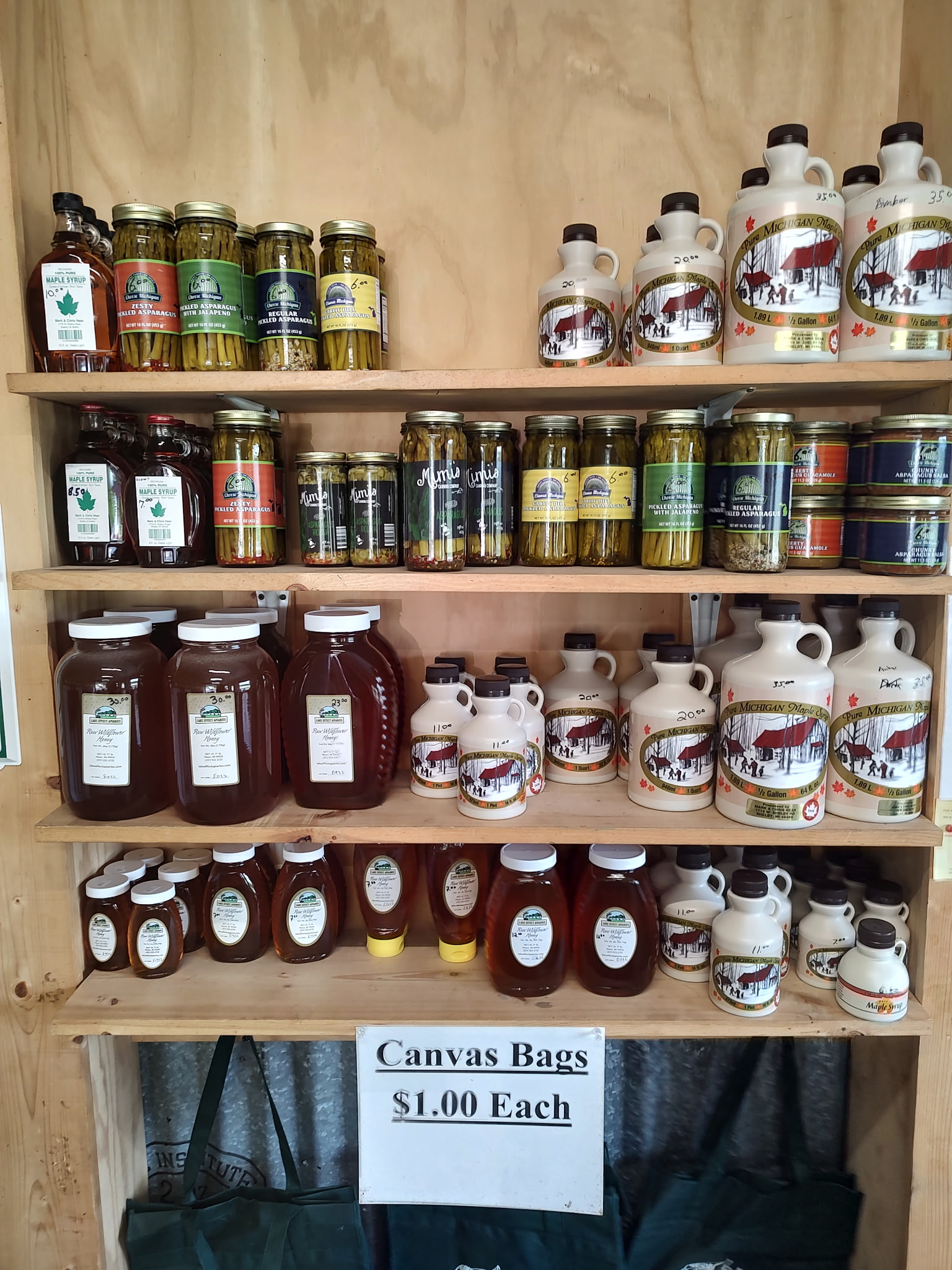 Shelves of preserves and jars at the market